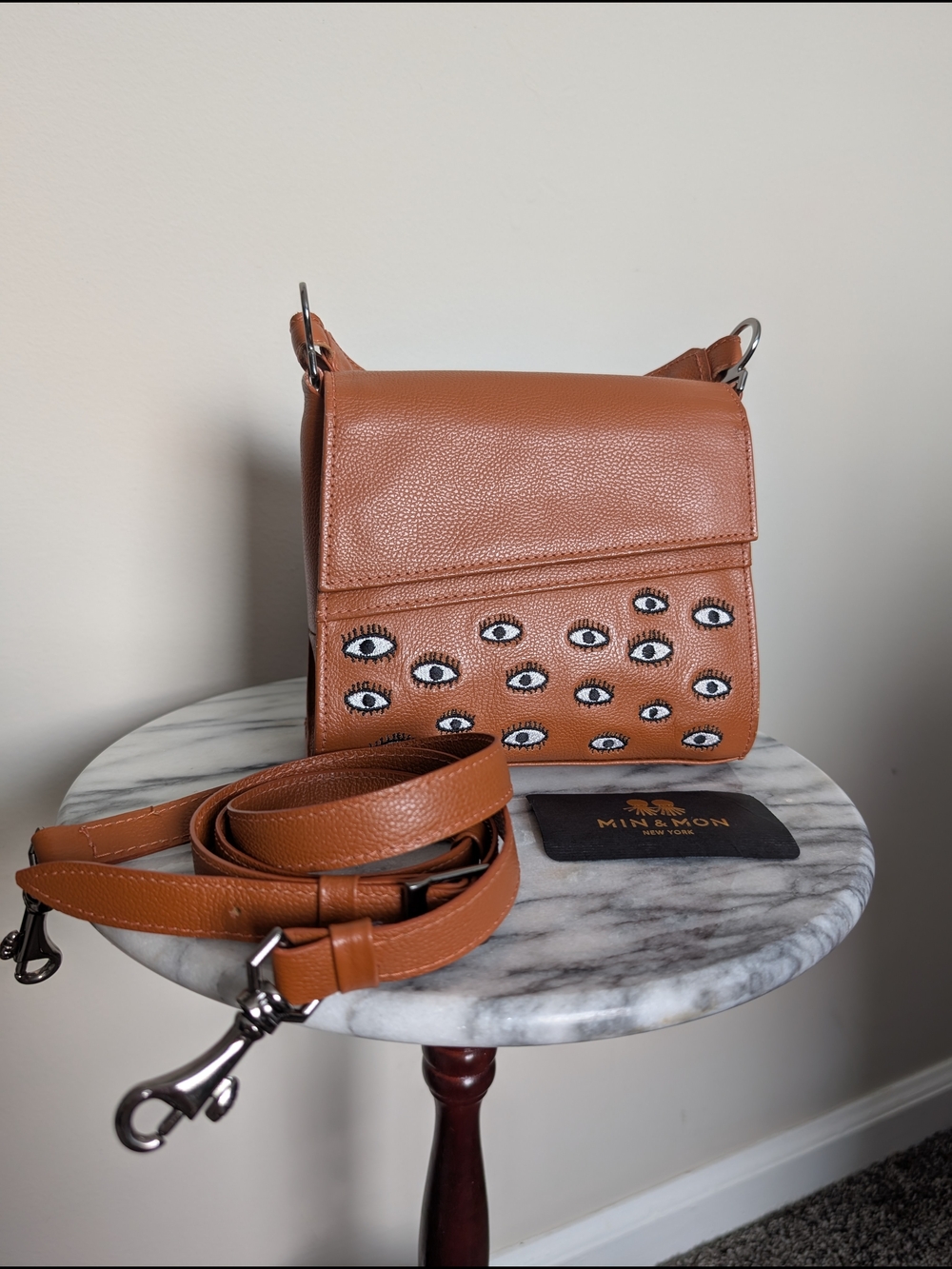 Min & Mon Tan Mini Crossbody Bag with Eye Embellishments